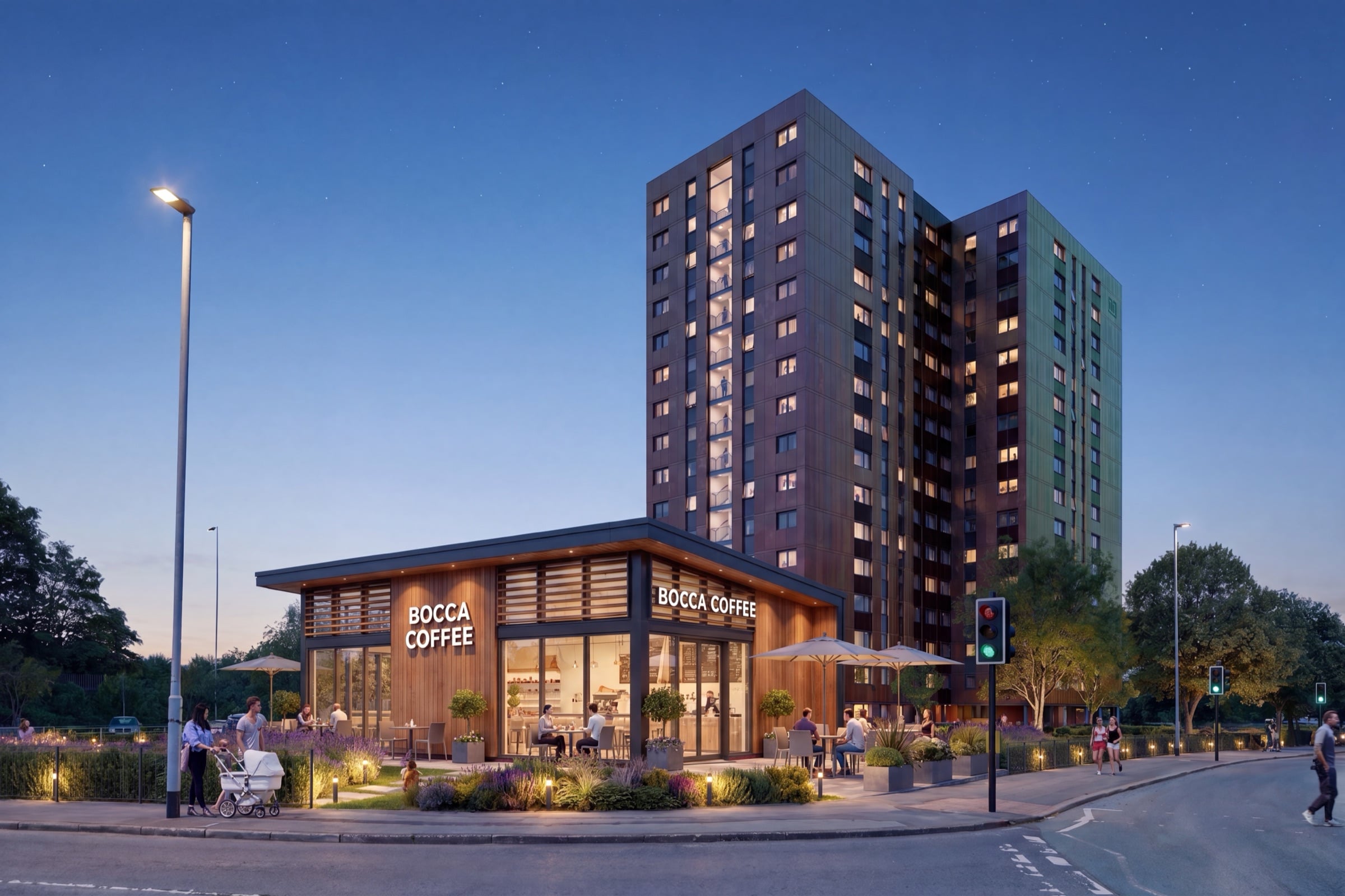 The ground-floor cafe at One Trafford Edge, lit at dusk beneath the tower