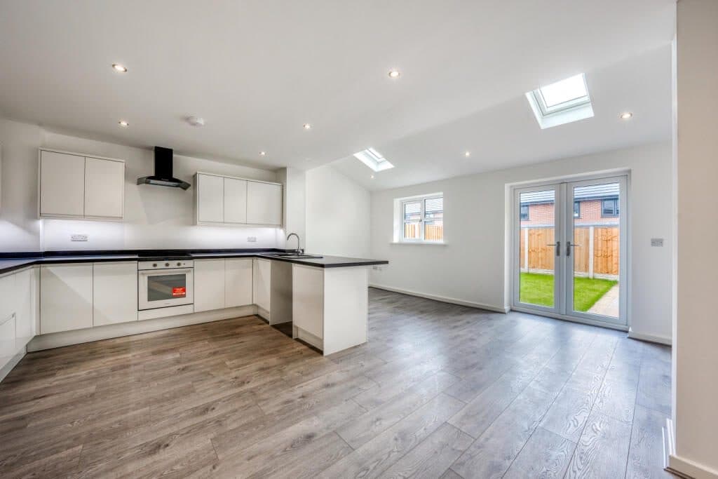A finished open-plan kitchen in a completed new-build home