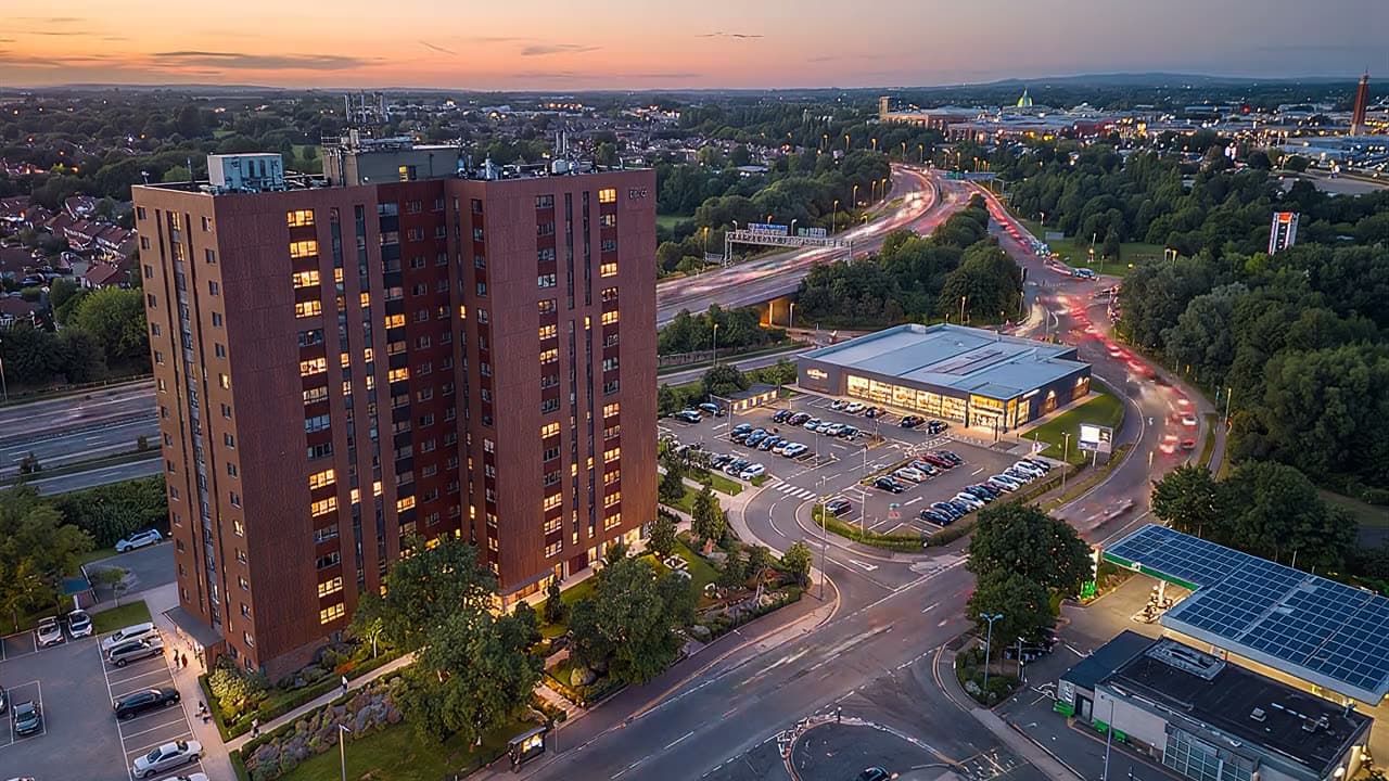 One Trafford Edge beside the Trafford Centre at dusk, in Greater Manchester
